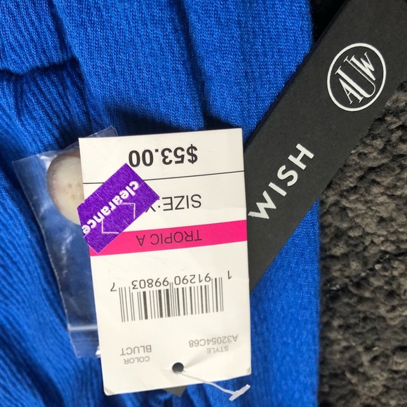 Never been worn, brand new jumpsuit, still has price tag on - Picture 5 of 5